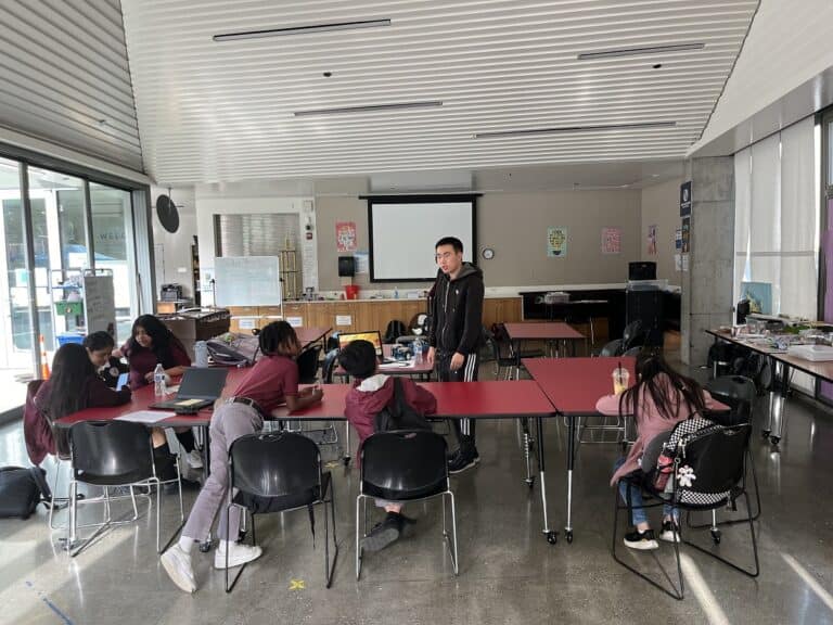 Elvin teaches mBots at the Boys & Girl Club